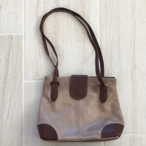 Maria’s brown and tan leather handbag Italy made